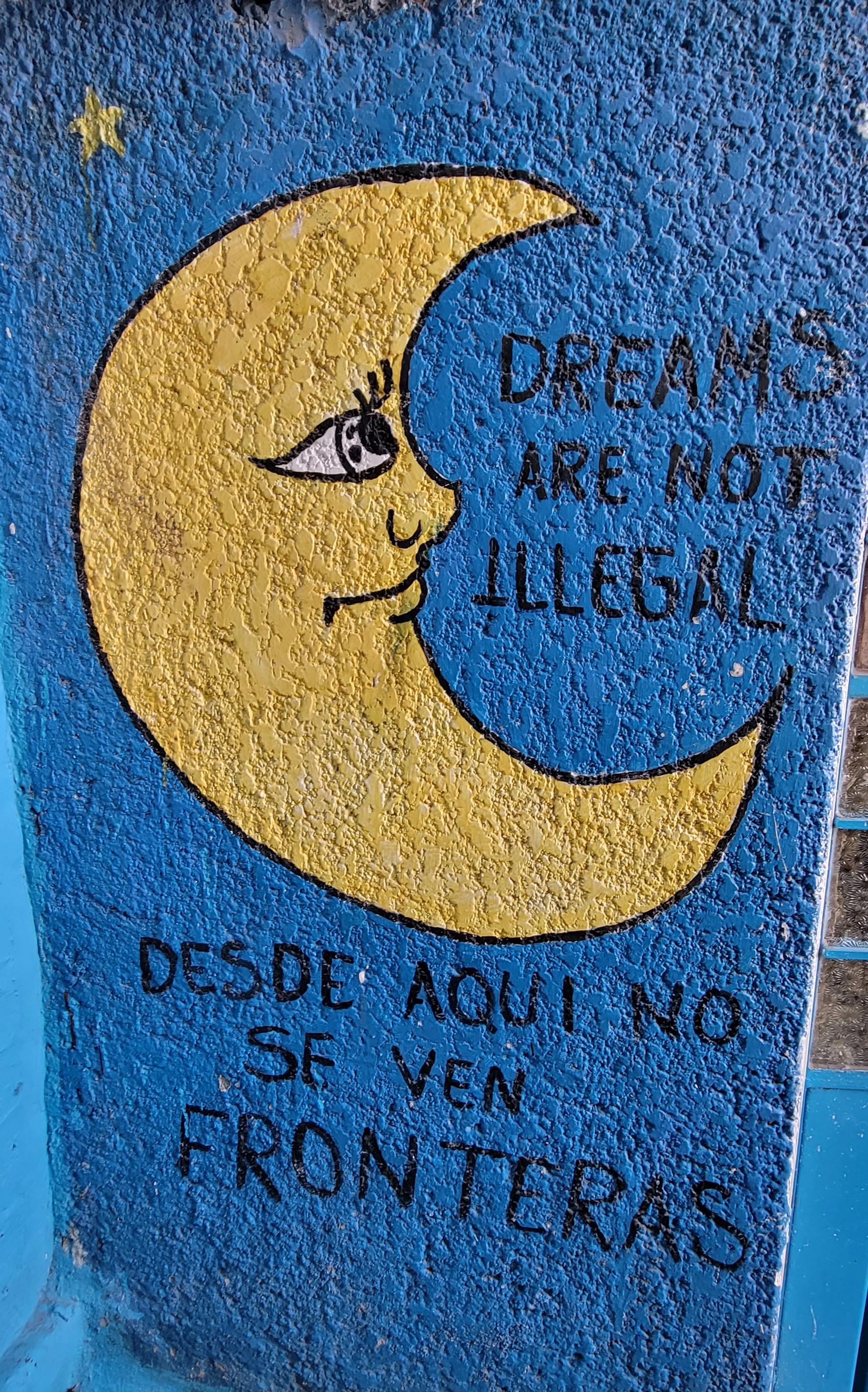 “Dreams are not illegal. We see no borders from here,” reads another mural painted by migrants Albergue Tochán.