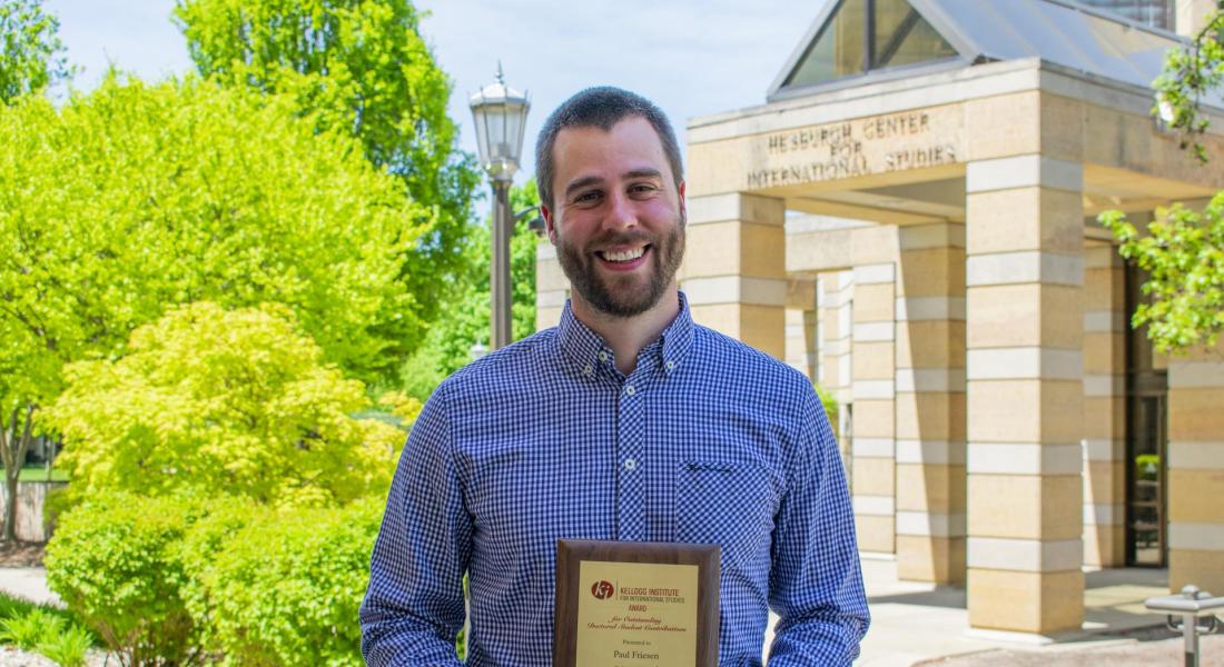 Paul Friesen accepts Doctoral Award