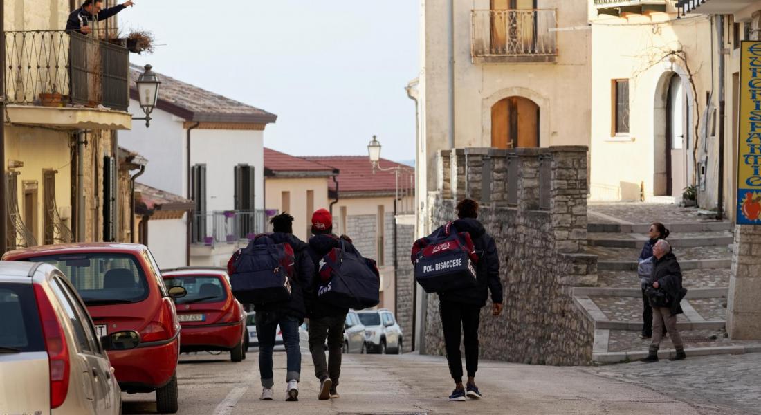Migrants in Bisaccia’s SPRAR return home from a soccer match