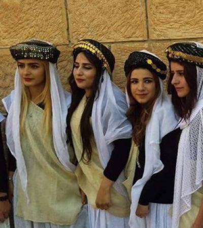 Yazidi girls in traditional clothes